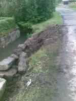 Oprava zdi potoka u bývalé moštárny